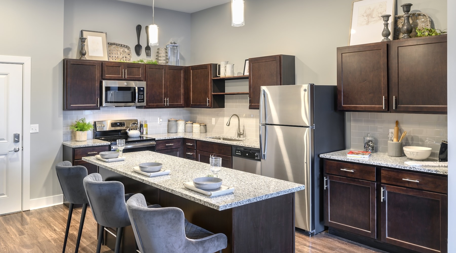 kitchen with an island and bar stools